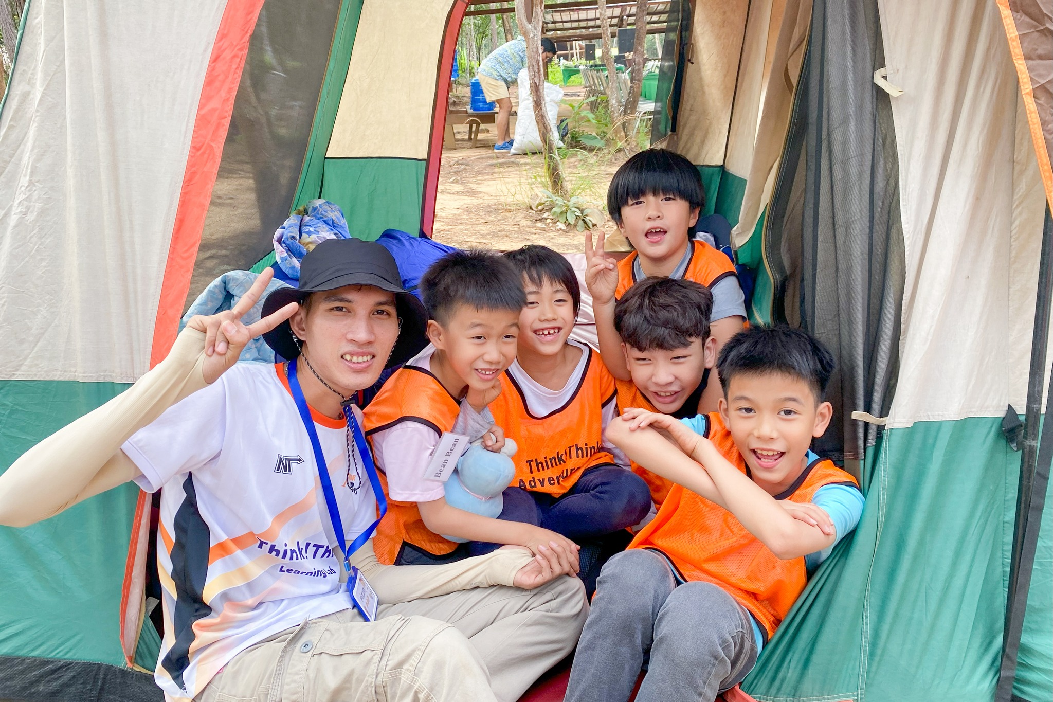 Children setting up a tent